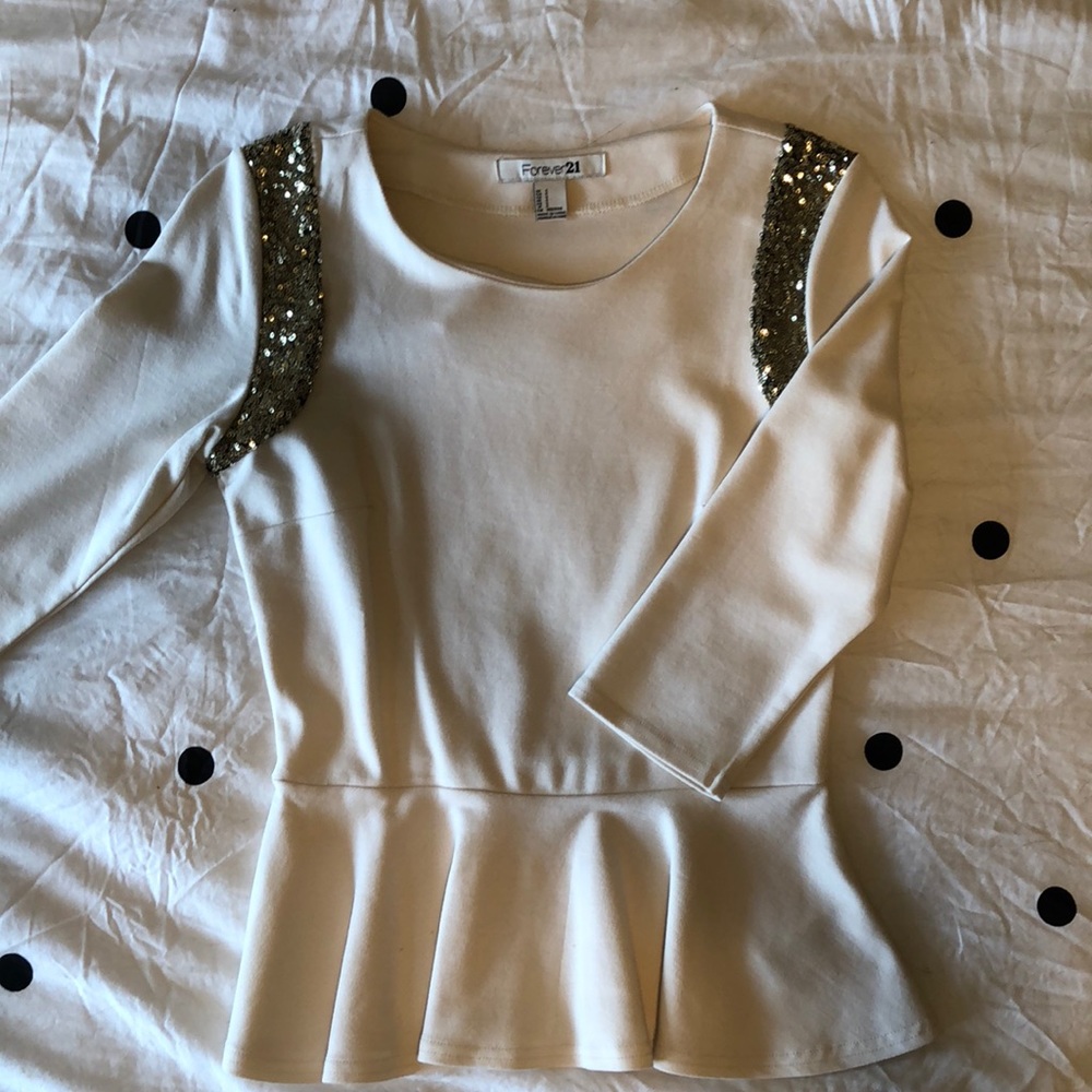 Cream and sequin peplum top